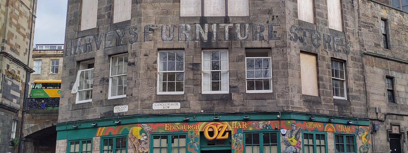 Building on Candlemaker Row with old, faded. painted sign.